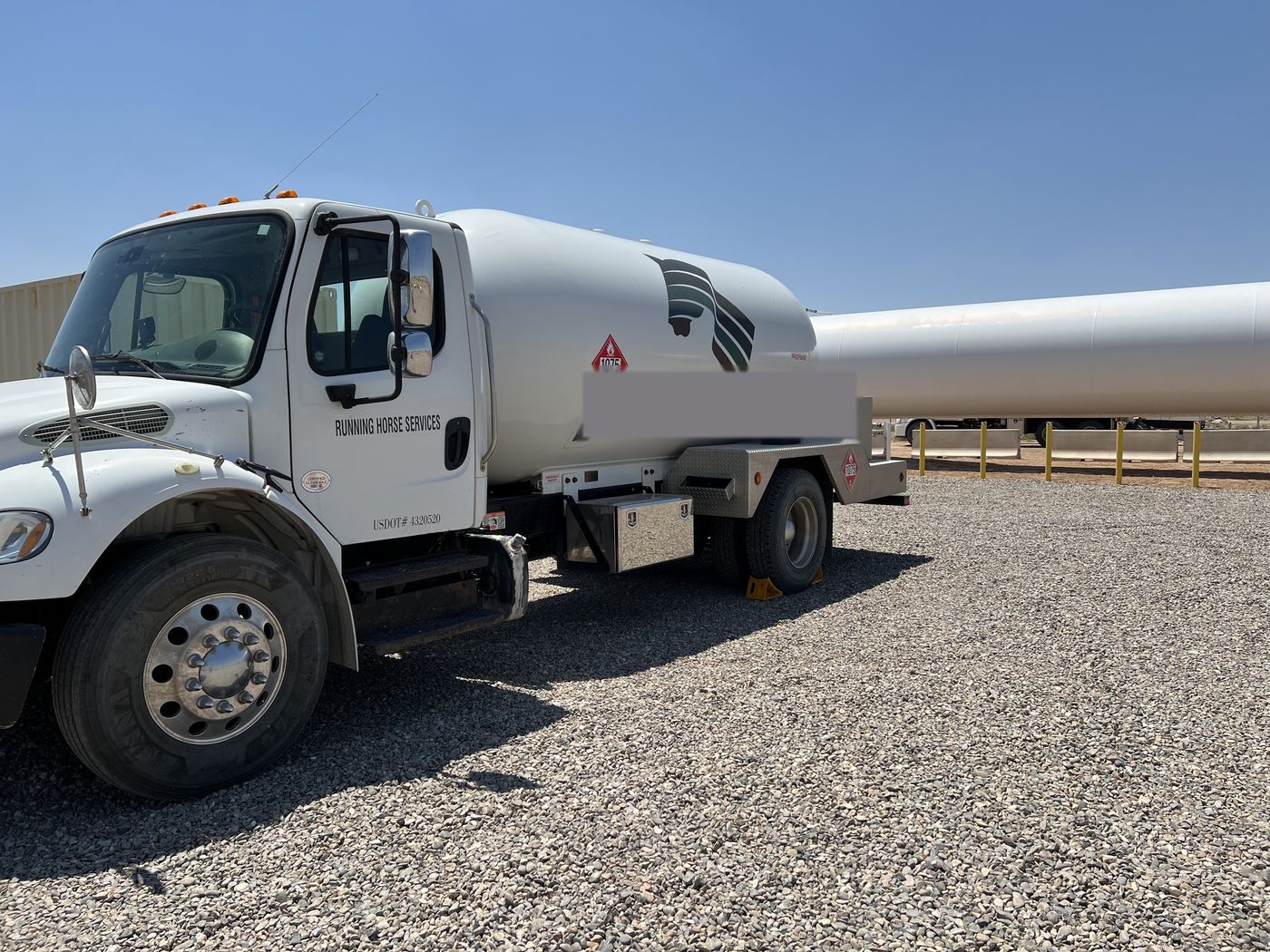 A real Running Horse Services propane bobtail tanker at the yard.
