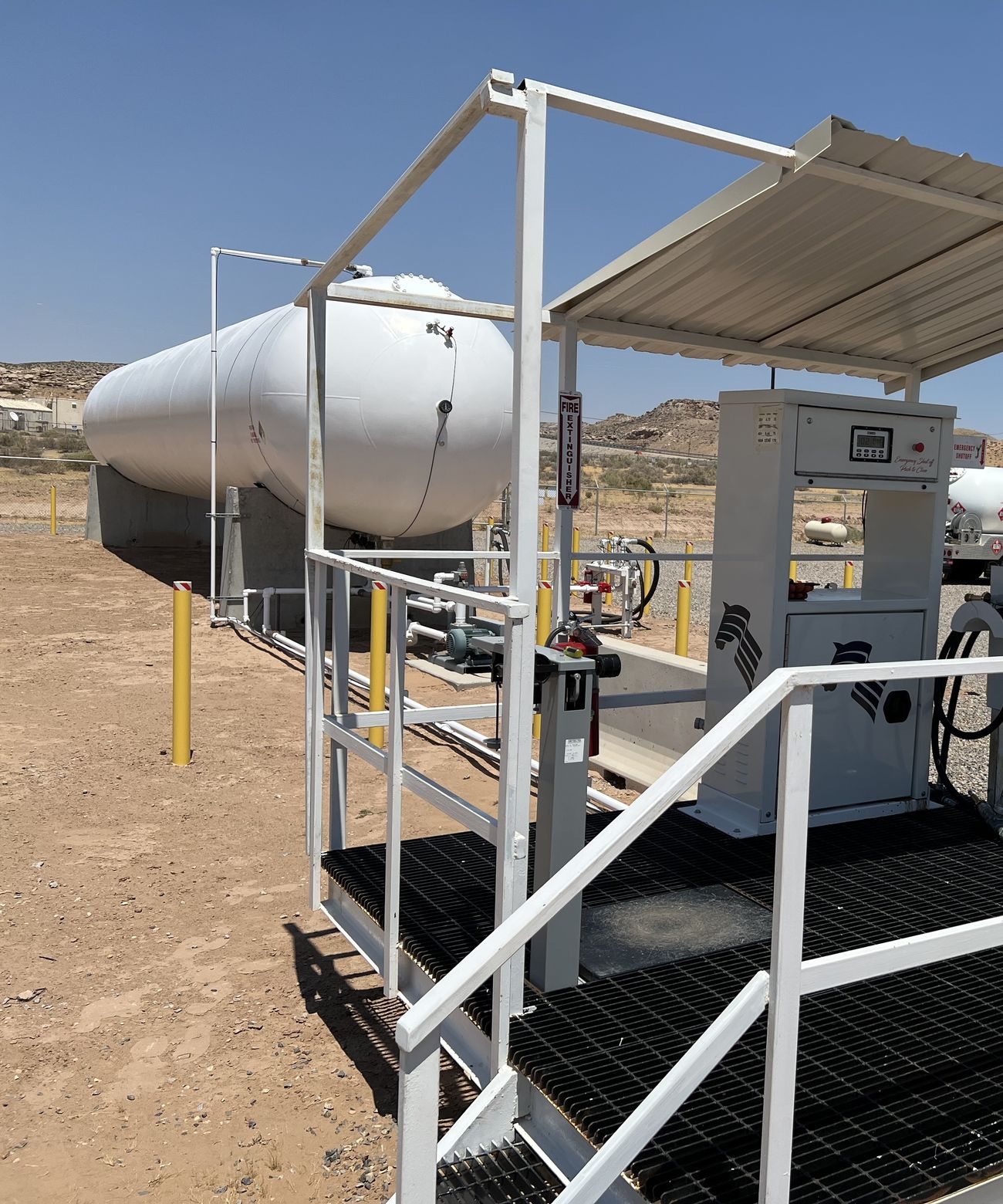 Our real propane fueling and dispensing station, with fire extinguisher and emergency shutoff clearly posted.